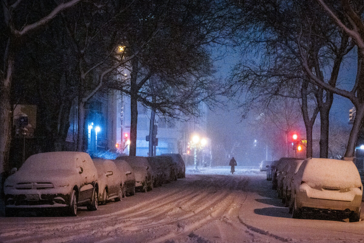 Minneapolis Snowstorm: Cyclist on Snow-Covered Street, Nov 2019