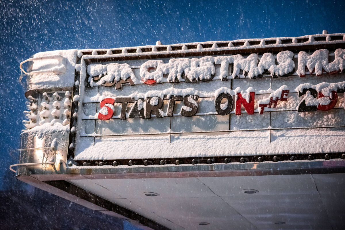 Snow-covered Lynlake Brewery marquee in Minneapolis during a winter storm.