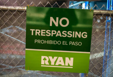 Sign that reads: No Trespassing. Prohibido EL Paso. Ryan.