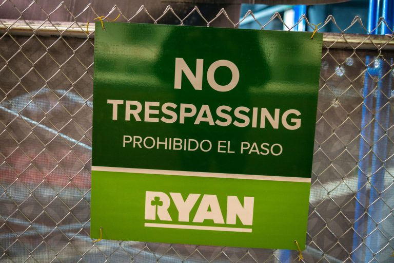 Ryan No Trespassing Sign, Minneapolis Construction Site 3 Ryan No Trespassing sign on a chain-link fence at a Minneapolis construction site.