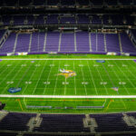 The interior of U.S. Bank Stadium in Minneapolis, home of the NFL’s Minnesota Vikings, shown from a high vantage point with an unobstructed view of the field. Completed in 2016 on the former site of the Metrodome, the <div id=