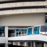 SkyConnect tram that connects the airport to the parking garage and rental car center.