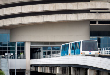 SkyConnect tram that connects the airport to the parking garage and rental car center.