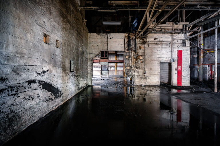 Brillion Iron Works foundry interior, Wisconsin 1 Brillion Iron Works foundry interior in Brillion, Wisconsin, with water on the floor.