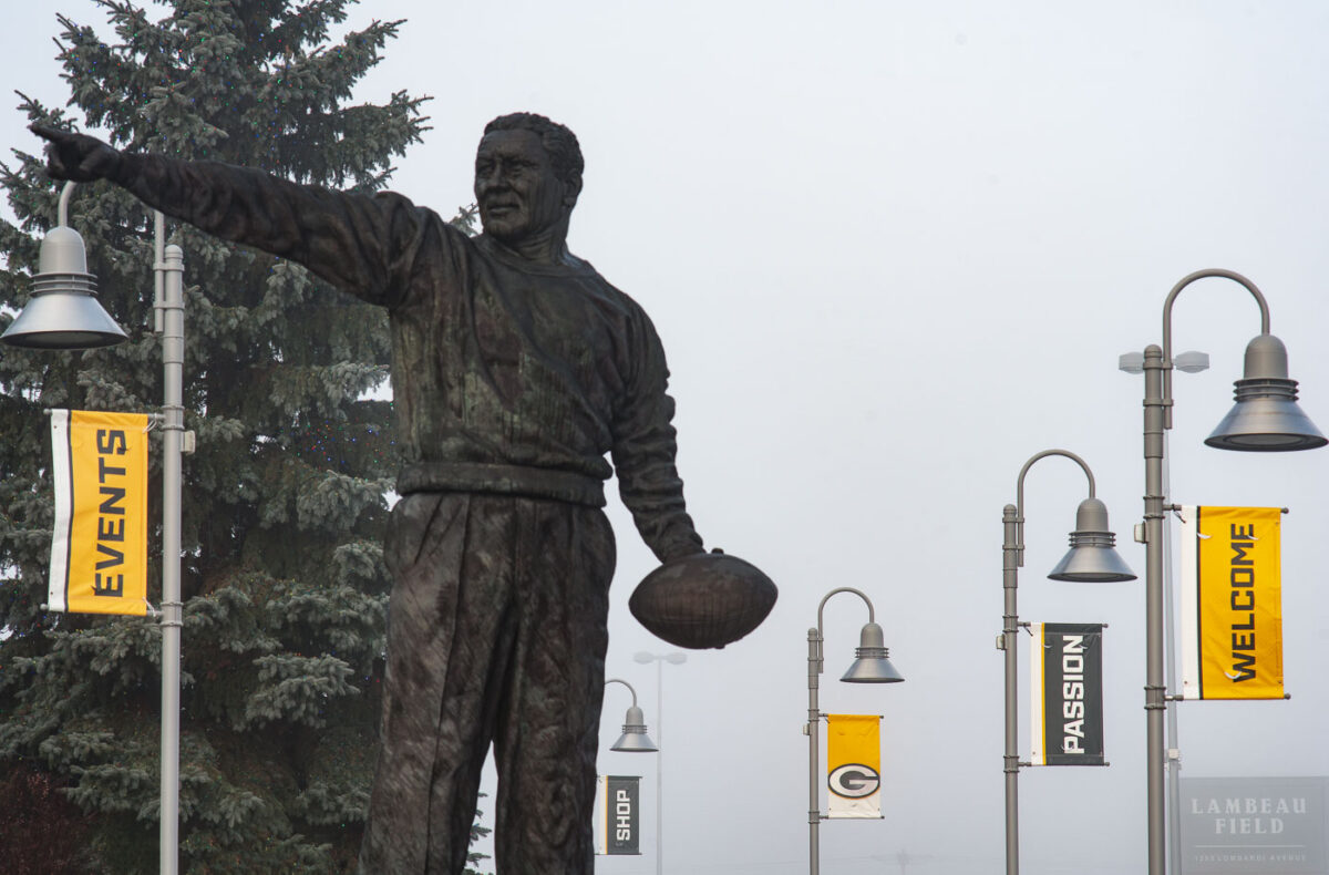 Curly Lambeau statue outside of Lambeau Field in Green Bay, WI. Lambeau Field is home to the Green Bay Packers NFL football team.