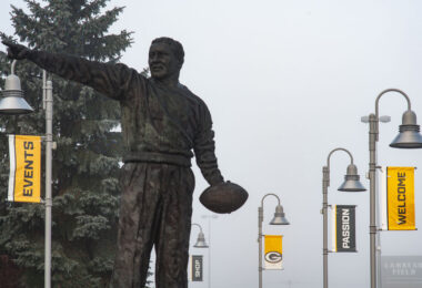 Curly Lambeau statue outside of Lambeau Field in Green Bay, WI. Lambeau Field is home to the Green Bay Packers NFL football team.