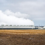 Steam billows from the Fox Energy Center near Kaukauna, Wisconsin, a natural gas-fired power plant that supplies electricity to the region. Operated by Wisconsin Public Service, the facility plays a key role in balancing renewable sources with reliable baseload generation across the state’s power grid.