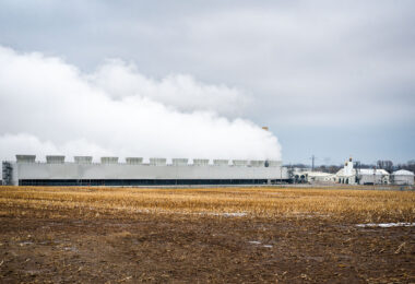 Steam billows from the Fox Energy Center near Kaukauna, Wisconsin, a natural gas-fired power plant that supplies electricity to the region. Operated by Wisconsin Public Service, the facility plays a key role in balancing renewable sources with reliable baseload generation across the state’s power grid.
