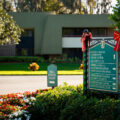 A sign directing visitors to various buildings around Innisbook Resort in Palm Harbor, Florida.