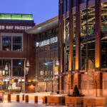 The Lambeau Field Atrium in Green Bay, Wisconsin at night.