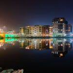 Downtown Green Bay, viewed from the west side of the Fox River. Main Street Bridge lit up to the left of the frame.