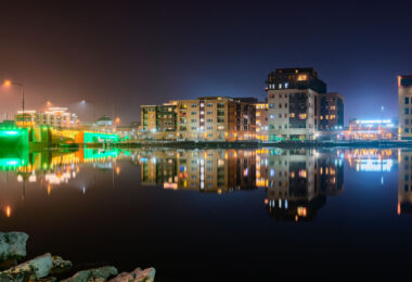 Downtown Green Bay, viewed from the west side of the Fox River. Main Street Bridge lit up to the left of the frame.