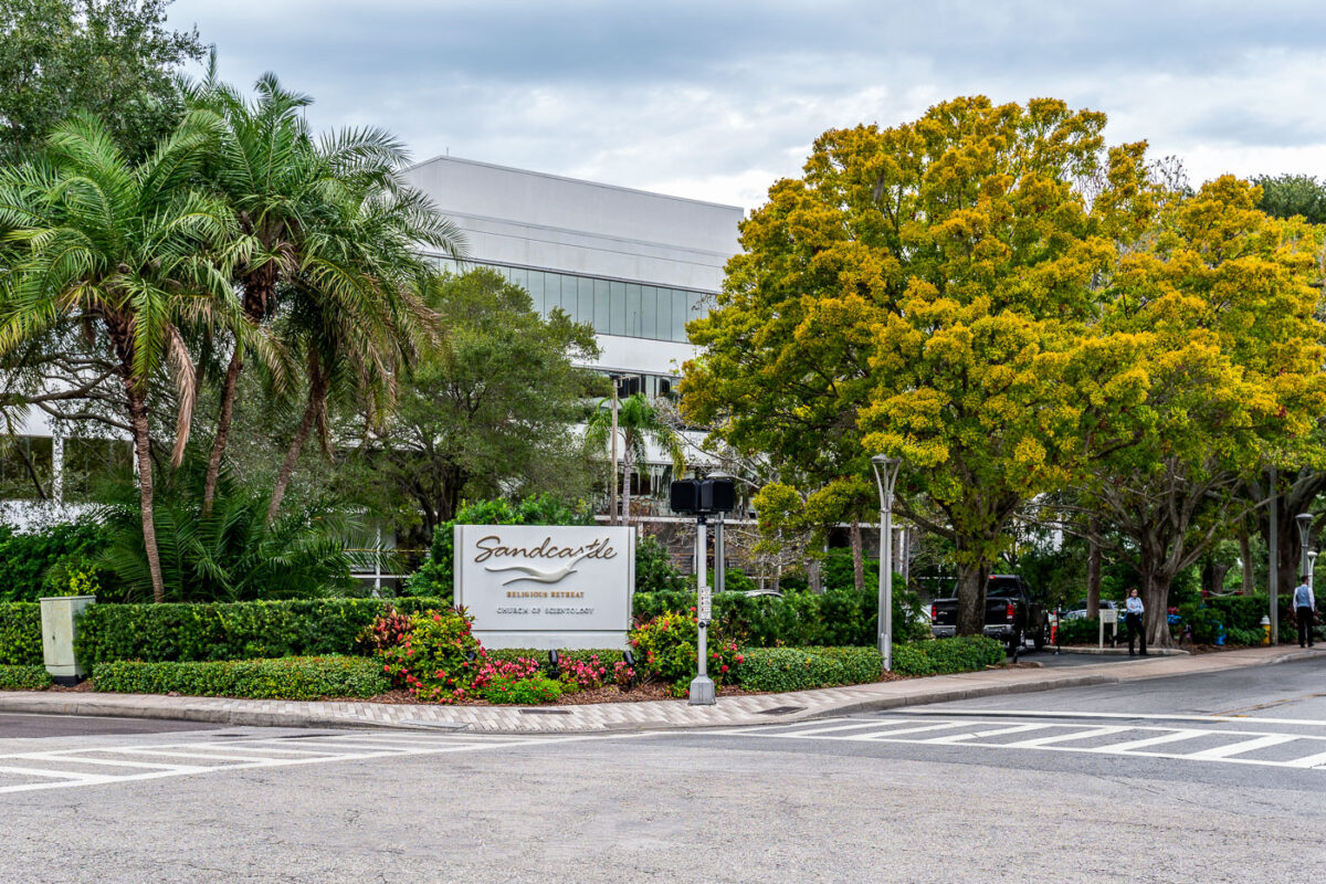 Located at 200 N Osceola Ave, the Sandcastle Religious Retreat is operated by the cult of Scientology in Clearwater, Florida. SeaOrg members stand guard outside.