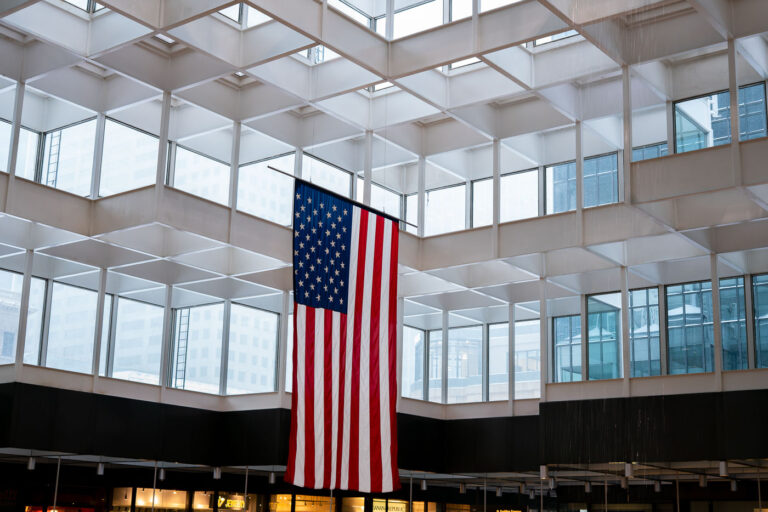 American Flag in the IDS Crystal Court 3 American flag hangs in the IDS center in downtown Minneapolis.