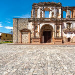 The Church and convent of the Society of Jesus in Antigua Guatemala is a religious complex that was built between 1690 and 1698. It was built on a block that is only 325 yards away from the Cathedral of Saint James on a lot that once belonged to the family of famous chronicler Bernal Díaz del Castillo and had three monastery wings and a church. There were only a maximum of 13 Jesuit priest at any given time in the building, but they also hosted Jesuit brothers and secular students. In the building was the San Lucas School of the Society of Jesus, until the Jesuits were expelled from the Spanish colonies in 1767.