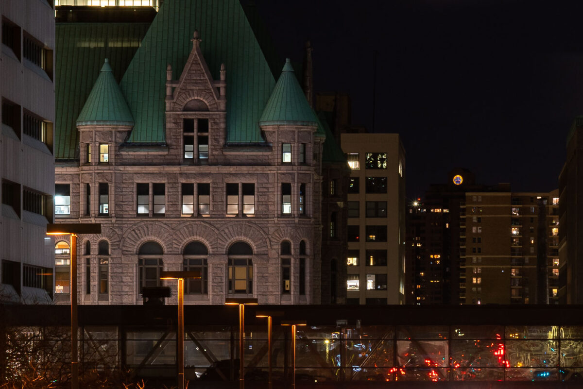 Minneapolis City Hall and a skyway on a February evening.