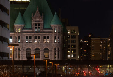 Minneapolis City Hall and a skyway on a February evening.