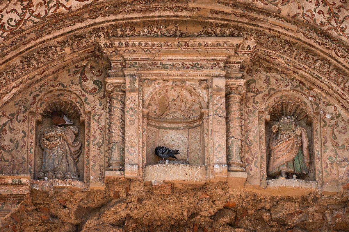 Saint Statues in Ornate Niches, Colonial Church Facade