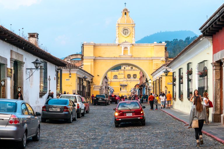 Santa Catalina Arch Spanning 5a Avenida Norte, Antigua Guatemala 4 Santa Catalina Arch, a yellow 17th-century colonial structure with clock tower, stands at the end of a cobblestone street in