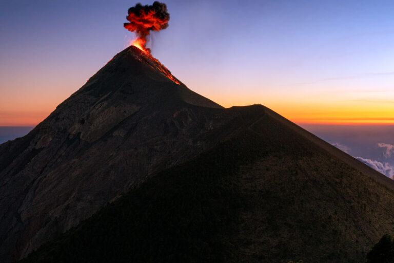 Sunset and volcano eruptions in Guatemala 4 An erupting volcano in Guatemala.