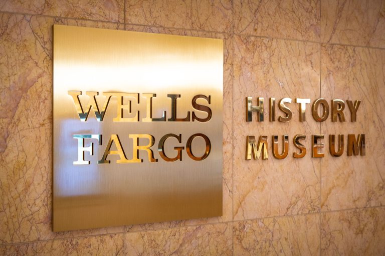 Wells Fargo History Museum, Wells Fargo Center, Minneapolis 4 Wells Fargo History Museum signage mounted on marble wall in Minneapolis.