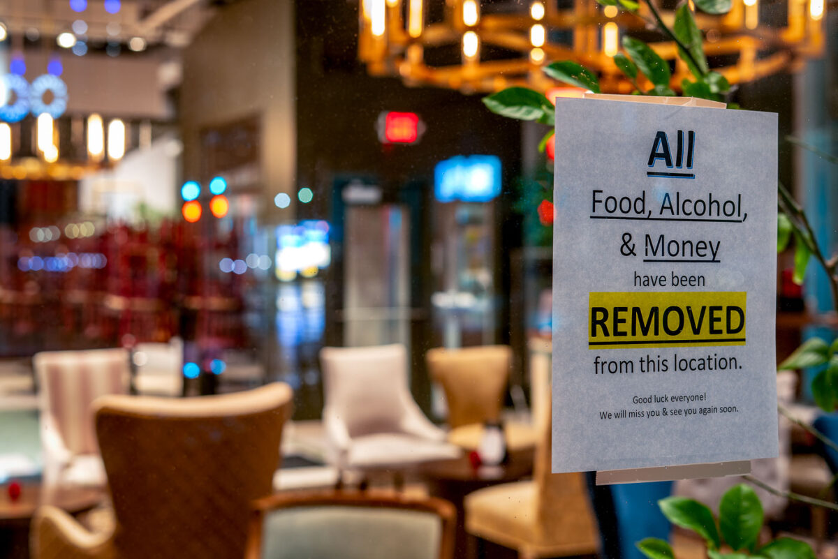 A sign on a downtown Minneapolis restaurant during the coronavirus (COVID-19) outbreak. Sign reads "All Food, Alcohol, & Money have been REMOVED from this location. Good luck everyone! We will miss you & See you again soon.: