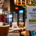 A sign on a downtown Minneapolis restaurant during the coronavirus (COVID-19) outbreak. Sign reads "All Food, Alcohol, & Money have been REMOVED from this location. Good luck everyone! We will miss you & See you again soon.: