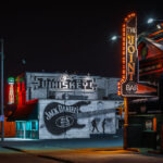 A large Jack Daniels mural on the Whiskey Junction building on Cedar Avenue in Minneapolis. The bar has been closed since at least 2020