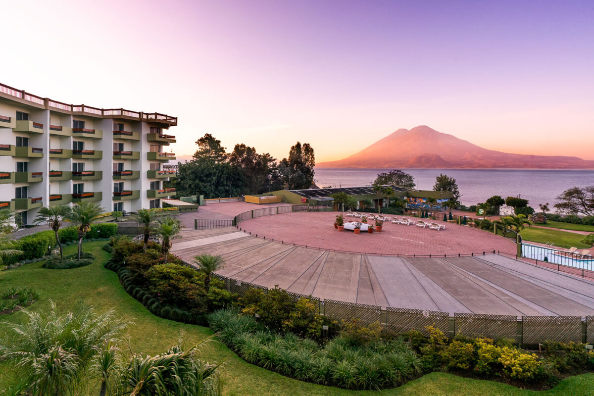 Volcán Tolimán and Volcán Atitlán as seen from Panajachel, Guatemala. Shot from Porta Hotel del Lago.