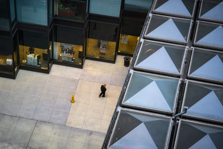 Man walks outside the IDS Center, Minneapolis 1 View from above the IDS Center Skyway