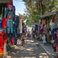 Market in Panajachel, Guatemala containing Mayan woven goods.