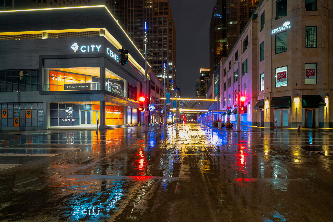 A rainy night in Downtown Minneapolis outside City Center during the early days of COVID-19.