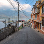 March 3, 2020 - San Pedro, Guatemala -- A woman walks in front of a jewelry and art gallery in San Pedro.