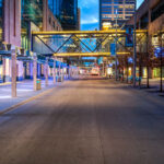 Single bus on Nicollet Mall during COVID-19 1 Nicollet Mall in Downtown Minneapolis during the coronavirus (COVID-19) outbreak. Normally busy with pedestrians and buses, only one Metro Transit Bus and bicycle is found in view.