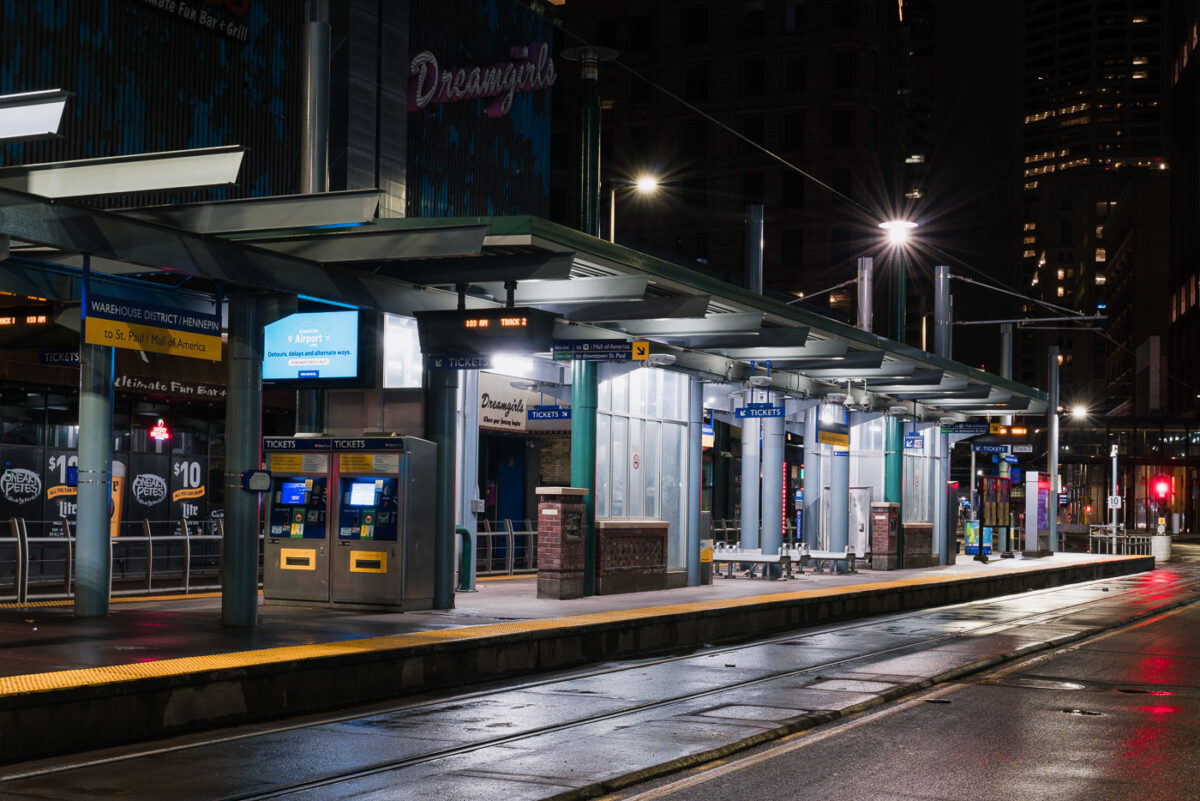Warehouse District/Hennepin light rail station in Downtown Minneapolis in the hours after the Minnesota Stay At Home order went into effect.