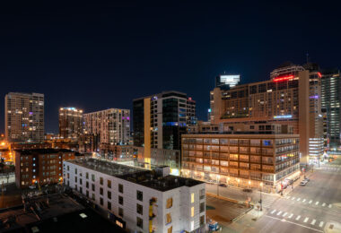 Downtown Minneapolis with Hyatt Place and Centre Village signs.