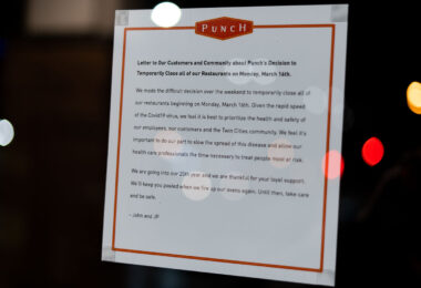 A sign on the door of Punch Restaurant in Minneapolis.