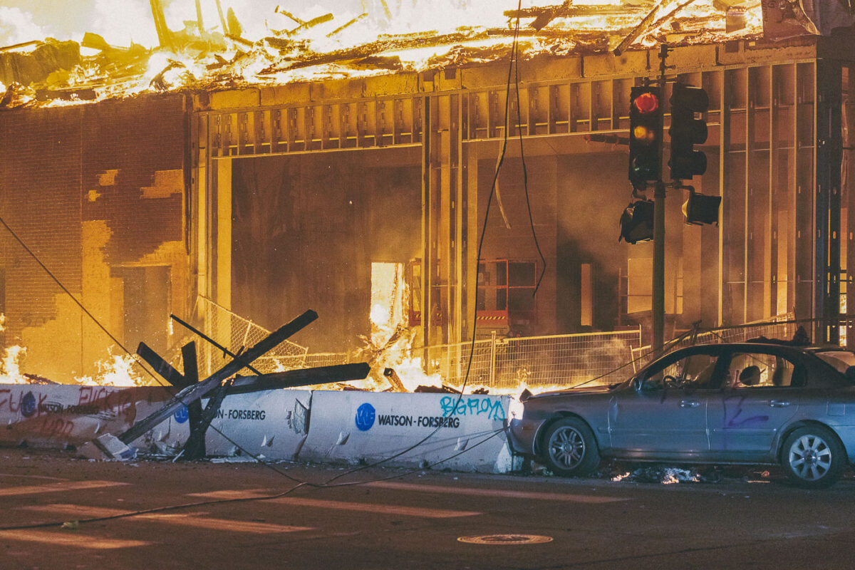 A 6-story new housing development on fire near the Minneapolis Police 3rd Precinct during the 2nd day of protests in Minneapolis following the death of George Floyd.