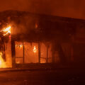 The AutoZone store across from the Minneapolis Police 3rd Precinct burning on the 2nd day of protests in Minneapolis following the death of George Floyd.  The AutoZone was the first building to be lit on fire during the George Floyd protests.