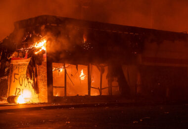 The AutoZone store across from the Minneapolis Police 3rd Precinct burning on the 2nd day of protests in Minneapolis following the death of George Floyd.  The AutoZone was the first building to be lit on fire during the George Floyd protests.