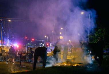 Barricades and a fire burns on the Target property on Minnehaha Ave during the 2nd day of protests in Minneapolis following the death of George Floyd.
