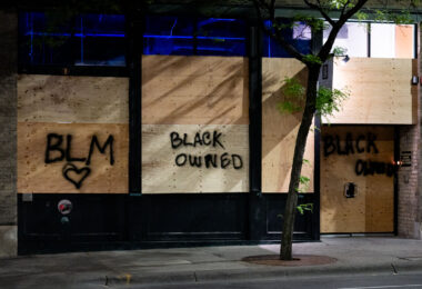 Boards on businesses in Downtown Minneapolis that read “BLM” “BLACK OWNED” on the 4th day of protests in Minneapolis following the death of George Floyd.