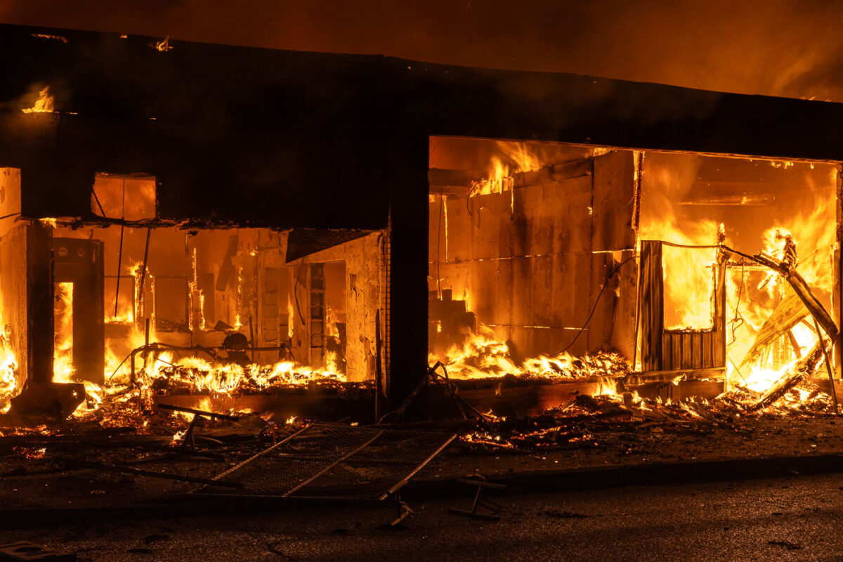 A building on fire on Lake Street in South Minneapolis on the 4th day of protests in Minneapolis following the death of George Floyd.