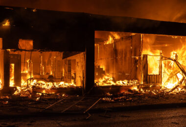 A building on fire on Lake Street in South Minneapolis on the 4th day of protests in Minneapolis following the death of George Floyd.