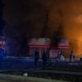 Minneapolis Police surround the burning AutoZone store during the 2nd day of protests in Minneapolis following the death of George Floyd. 

The AutoZone would be the first fire during the days of rioting.