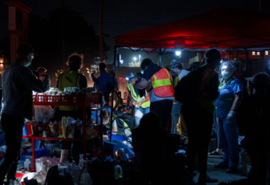 Community medics tend to those injured at protests outside the Minneapolis Police 3rd Precinct.