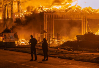 A 6-story new housing development on fire near the Minneapolis Police 3rd Precinct during the 2nd day of protests in Minneapolis following the death of George Floyd.