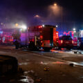 Minneapolis Fire Department works on putting out fires on the corner of East Lake Street and Minnehaha Avenue. The AutoZone on the corner was the first fire lit during the uprising.