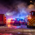 Minneapolis Fire Department works on putting out fires on the corner of East Lake Street and Minnehaha Avenue. The AutoZone on the corner was the first fire lit during the uprising.