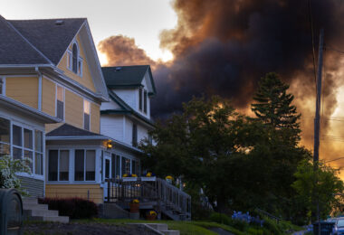 Smoke fills the sky on May 30, 2020 after a night of fires following 4 days of protests after the death of George Floyd.